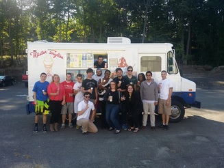 Photo showing mister softee ice cream truck party for staff